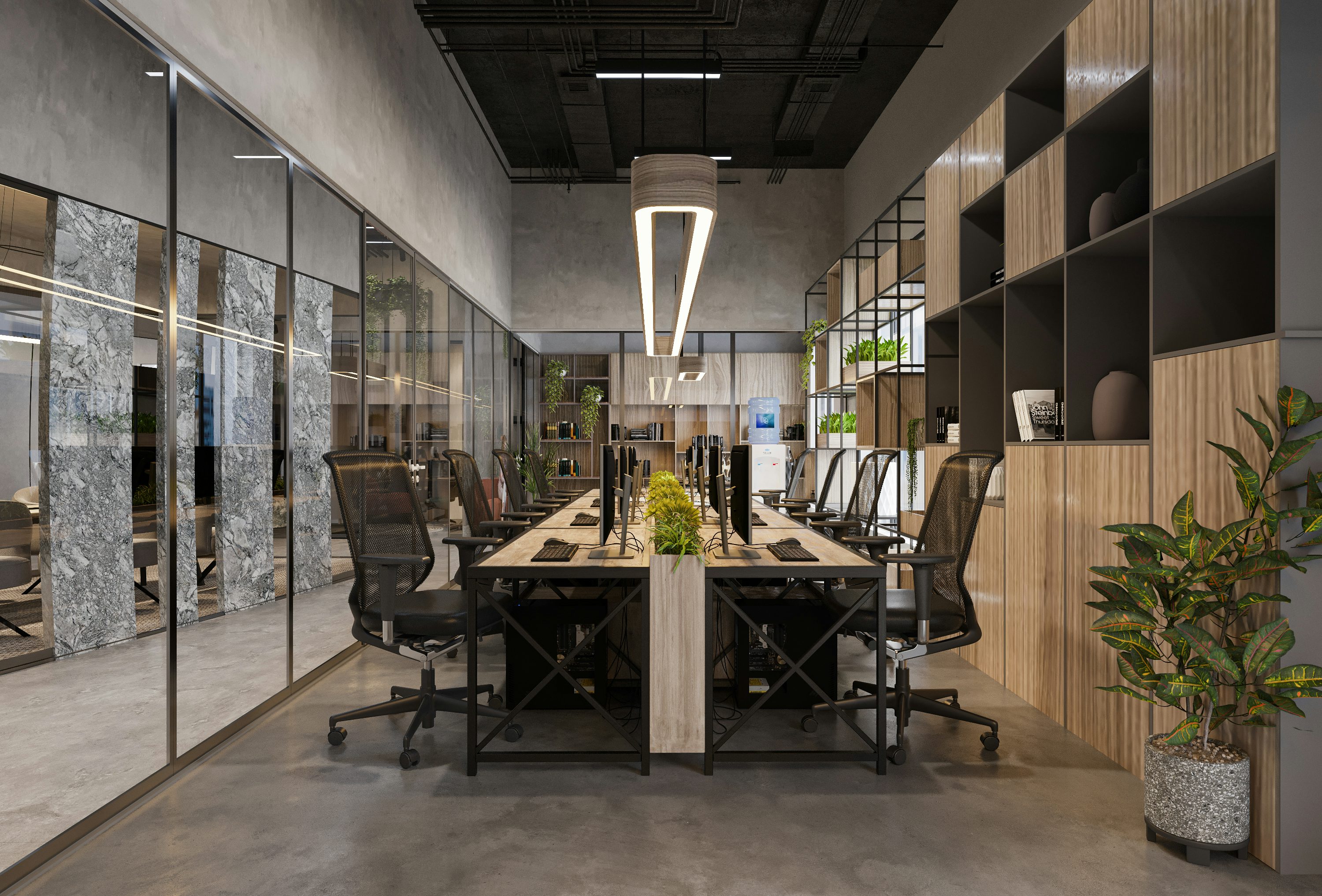 Sala de reunião organizada com mesa longa e cadeiras vazias.
